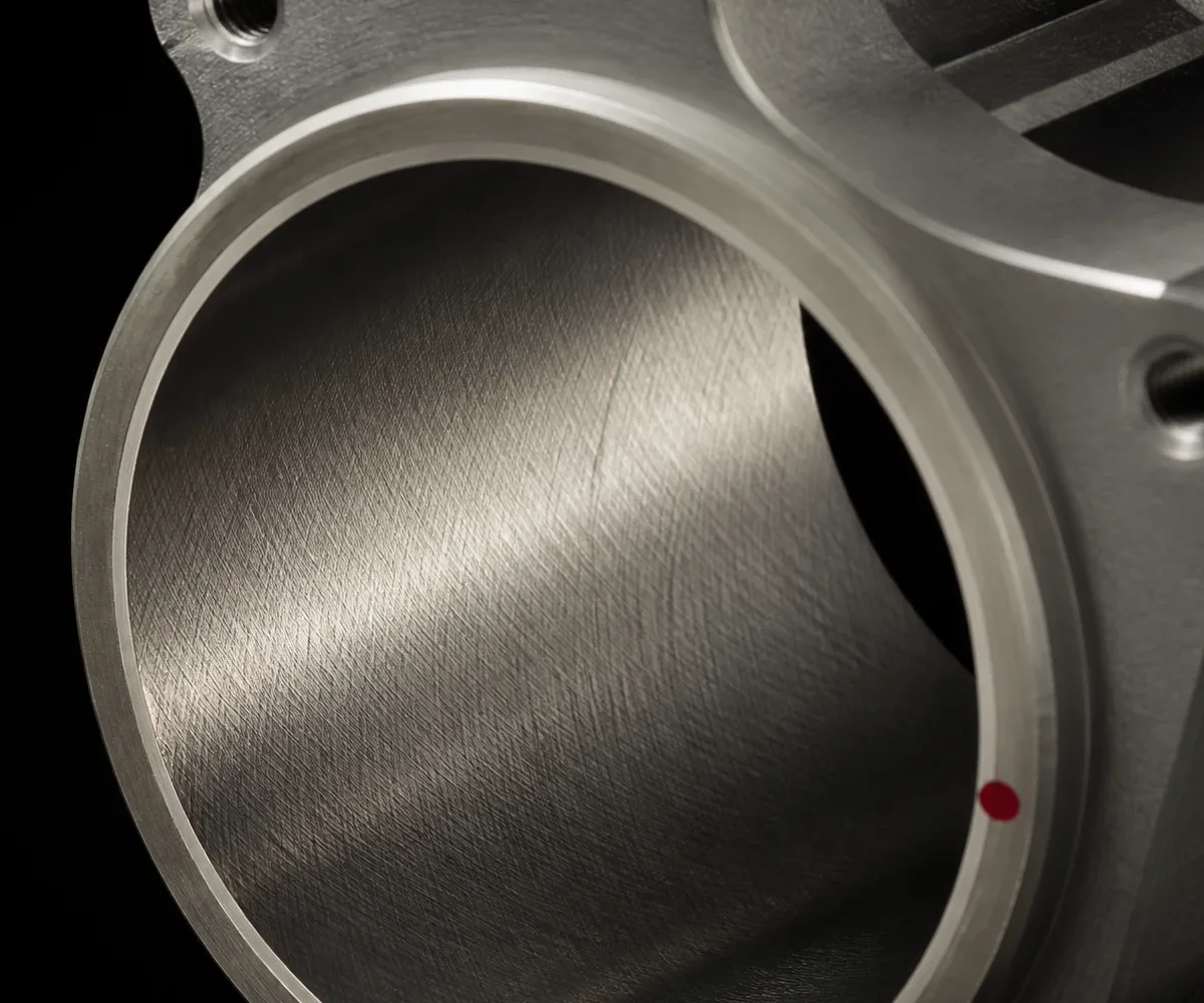 Macro of a honed bore wall, the cross-hatch pattern consistent across the surface.